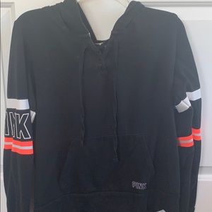 Pink hoodie with lace up detailing